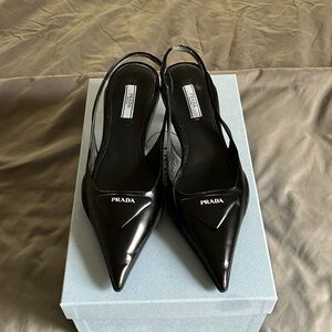 Prada black leather kitten heel with rubber athletic sole size 37.5